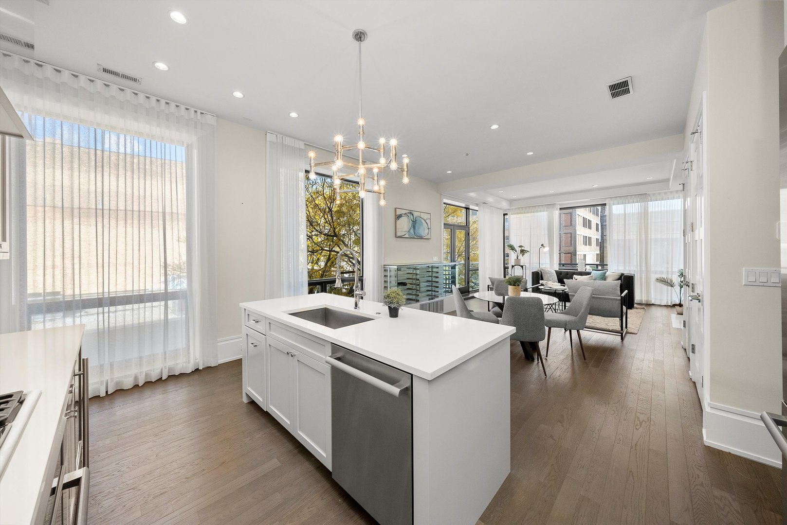 1258 North Milwaukee Avenue, Unit 3N Chicago, IL 60622 - Photo 13 of 36 a large white kitchen with a large window