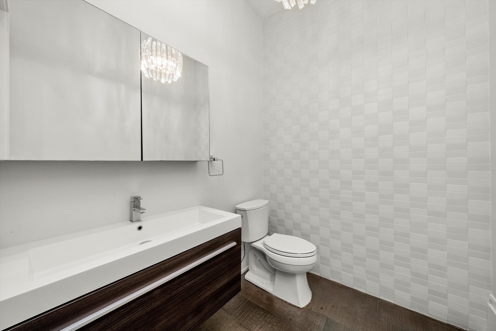 1258 North Milwaukee Avenue, Unit 3N Chicago, IL 60622 - Photo 25 of 36 a bathroom with a toilet and a sink