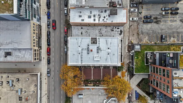 a view of street with an outdoor seating