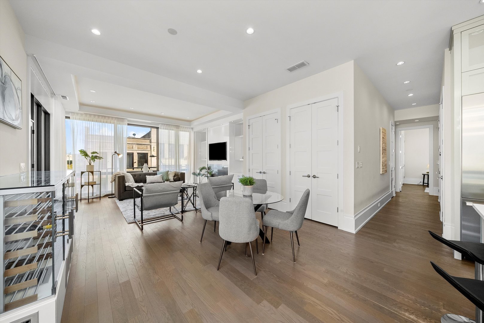 1258 North Milwaukee Avenue, Unit 3N Chicago, IL 60622 - Photo 6 of 36 a living room with furniture or wooden floor and a rug