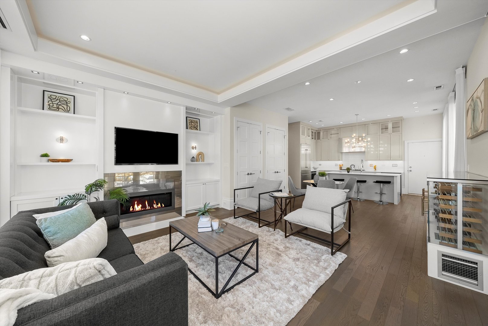 1258 North Milwaukee Avenue, Unit 3N Chicago, IL 60622 - Photo 10 of 36 a living room with furniture and a flat screen tv