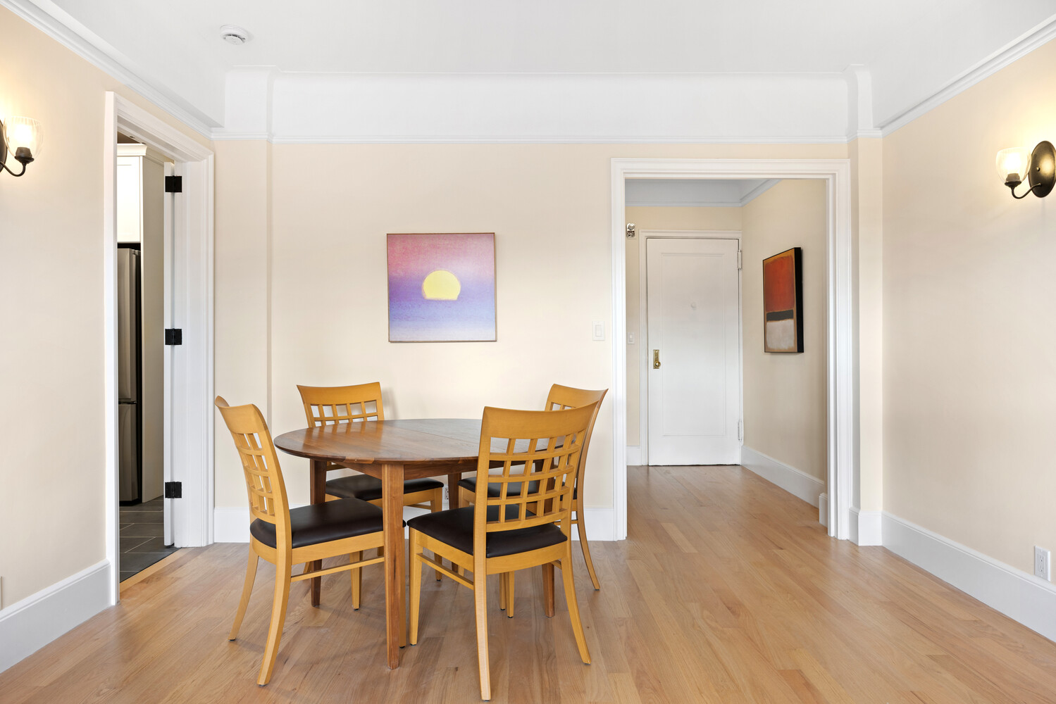 40 West 77th Street, Unit 10D Manhattan, NY 10024 - Photo 3 of 9 a view of a dining room with furniture and wooden floor