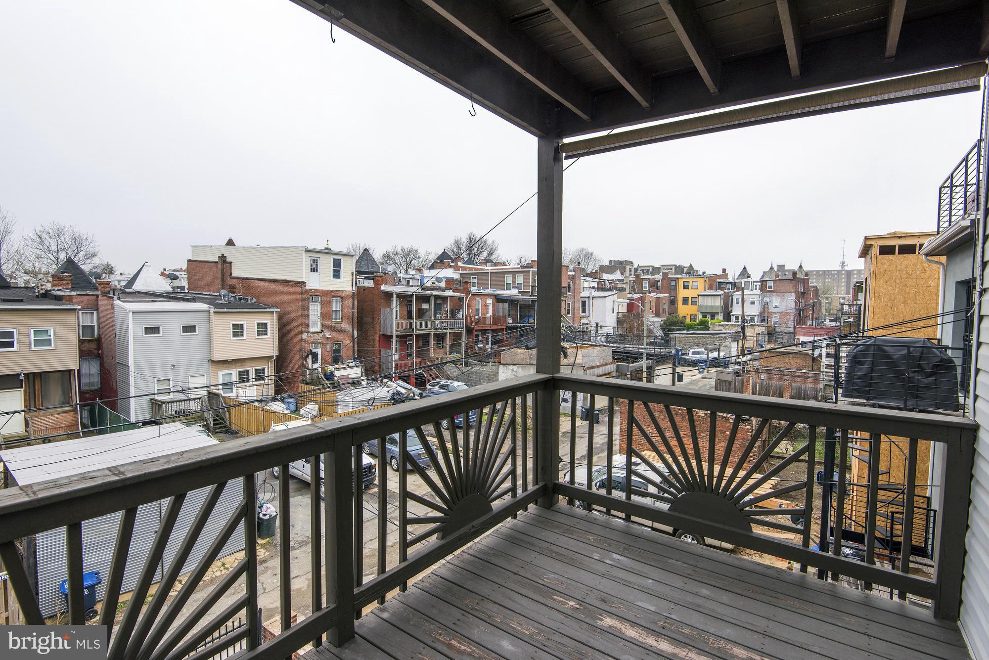 1126 Columbia Road Northwest, Unit 3 Washington, DC 20009 - Photo 18 of 23 a view of city from a balcony