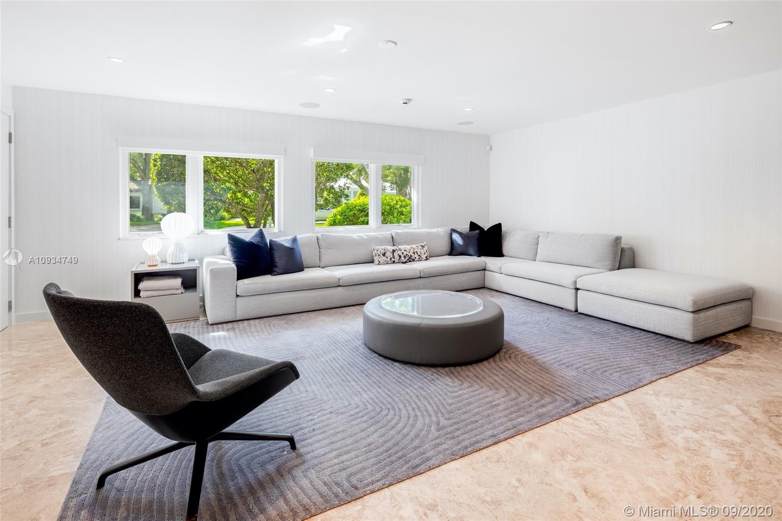4301 Bay Point Road Miami, FL 33137 - Photo 13 of 33 a living room with furniture and a large window