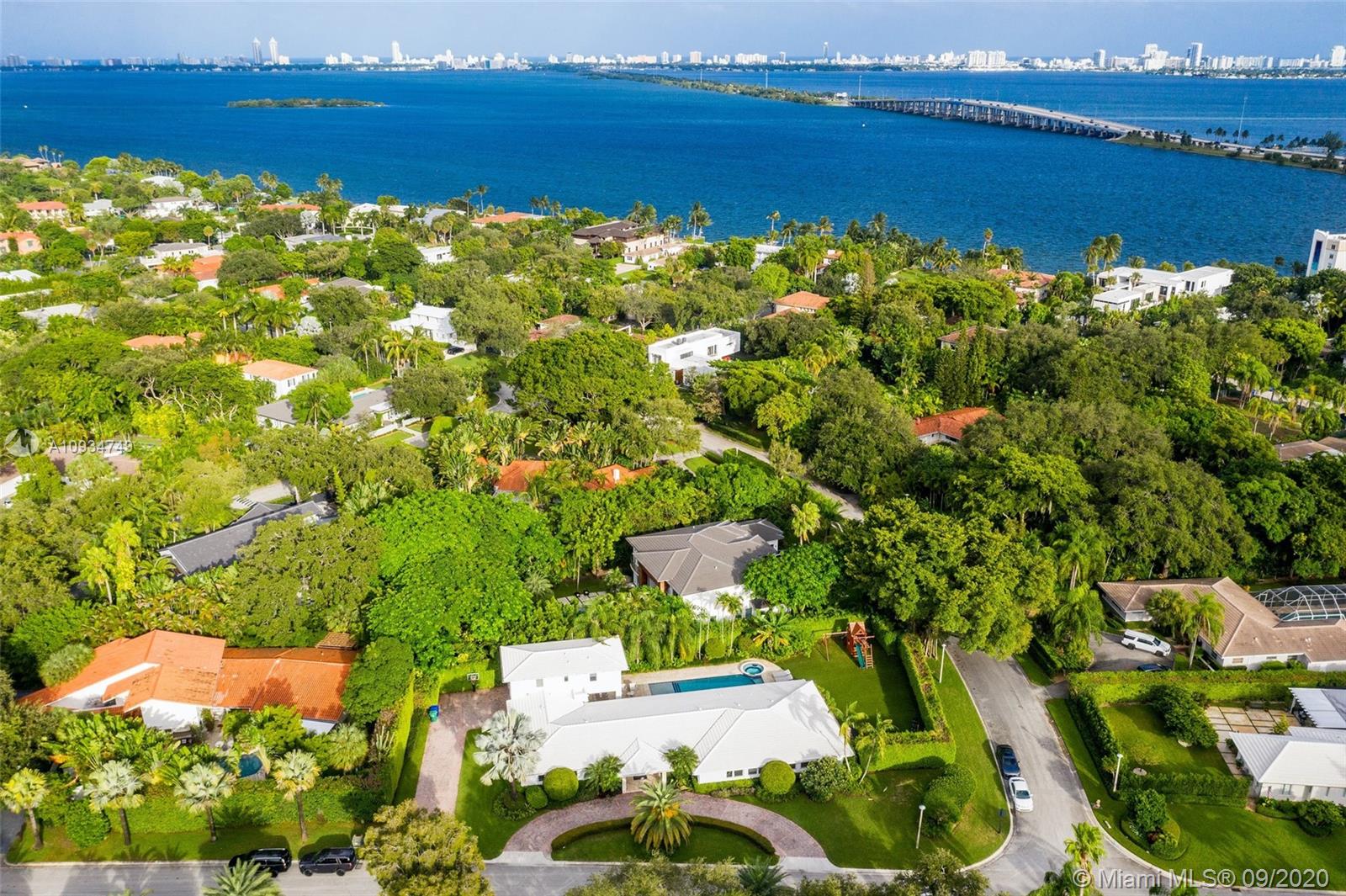 4301 Bay Point Road Miami, FL 33137 - Photo 31 of 33 an aerial view of ocean and residential houses with outdoor space