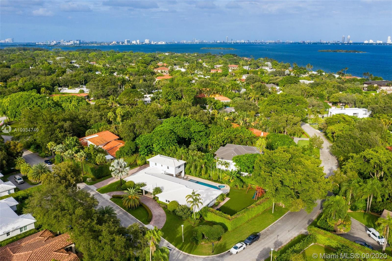 4301 Bay Point Road Miami, FL 33137 - Photo 32 of 33 an aerial view of a residential houses with outdoor space and street view