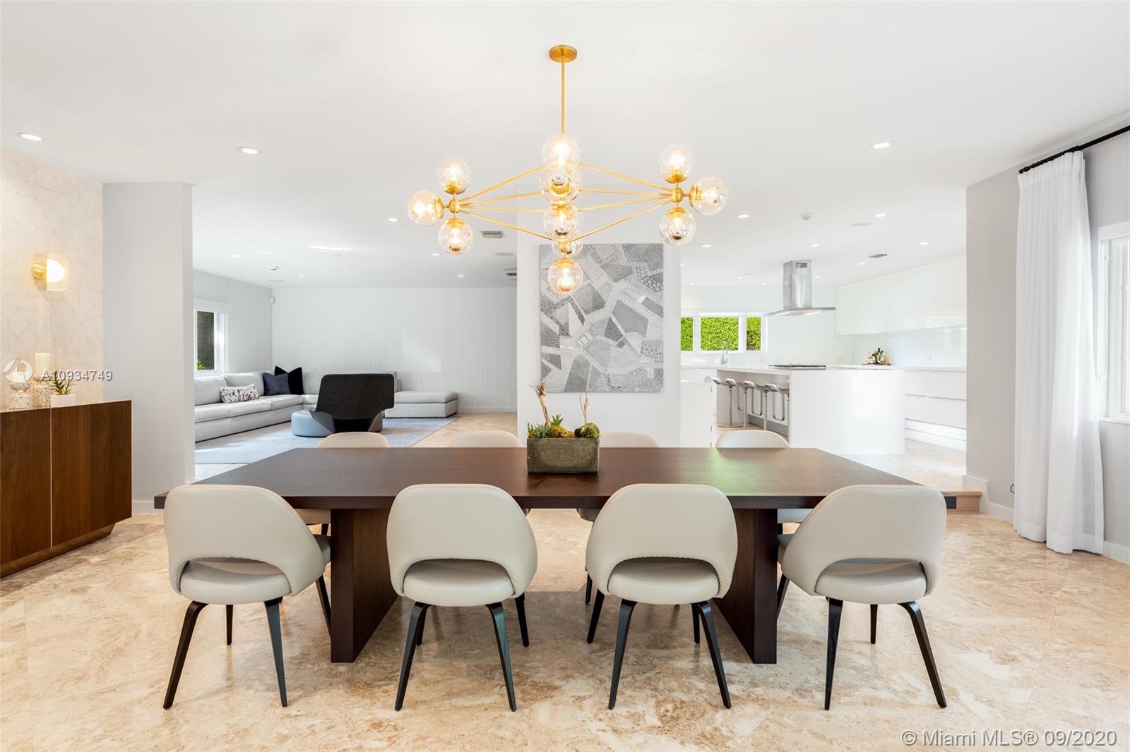 4301 Bay Point Road Miami, FL 33137 - Photo 6 of 33 a view of a dining room with furniture