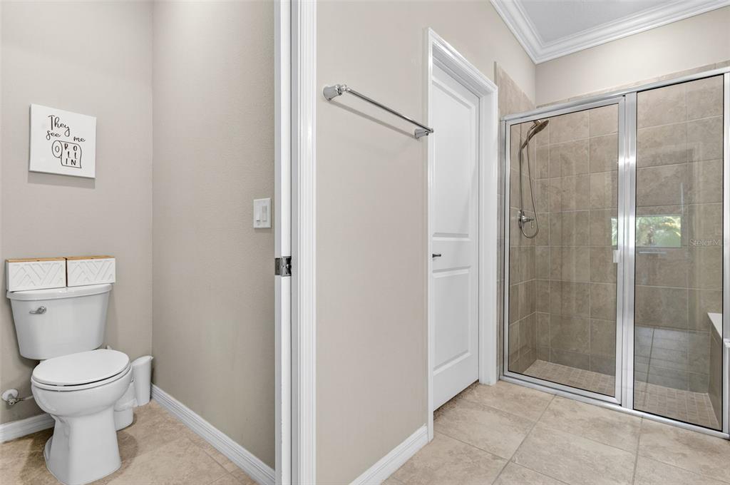 6427 Mooring Line Circle Apollo Beach, FL 33572 - Photo 29 of 34 a bathroom with a toilet and a shower