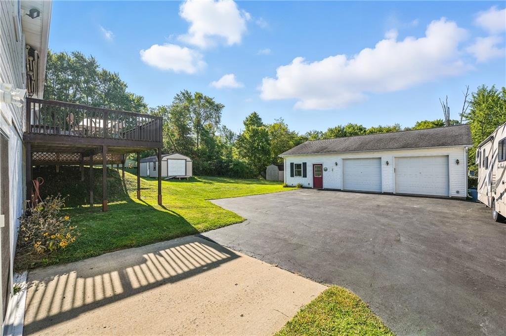3699 Mitchell Road New Castle, PA 16105 - Photo 2 of 14 a front view of a house with a yard