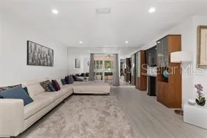a living room with furniture and a view of living room