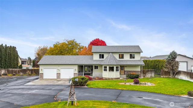 a front view of a house with swimming pool and porch