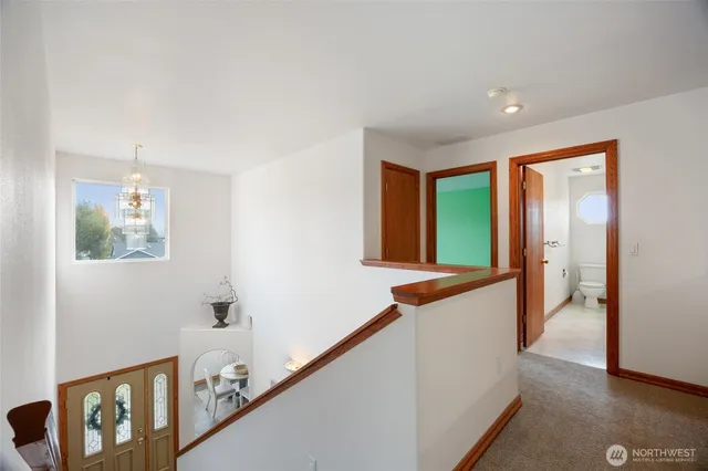 wooden floor in an empty room and a window