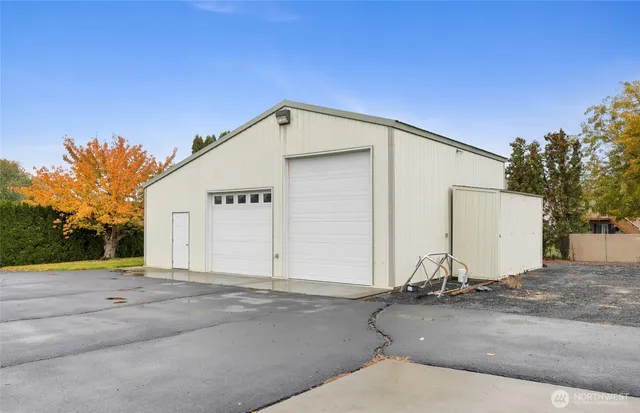 a view of a terrace with couches and lounge chairs