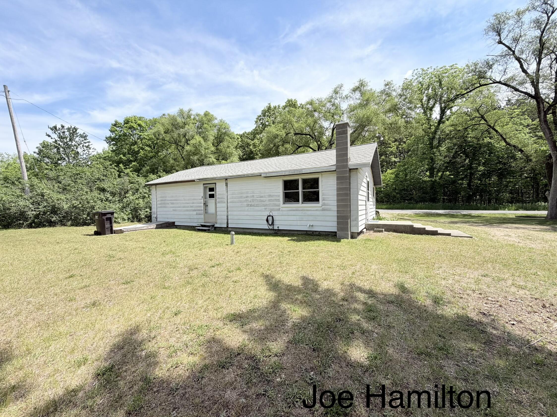 391 North Briggs Road Middleville, MI 49333 - Photo 4 of 18 back of home