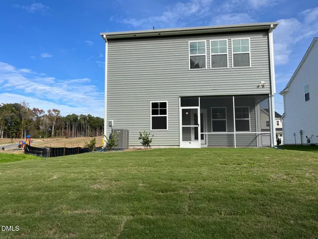 a view of pool with trees in the background