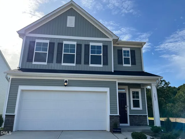 a front view of residential houses
