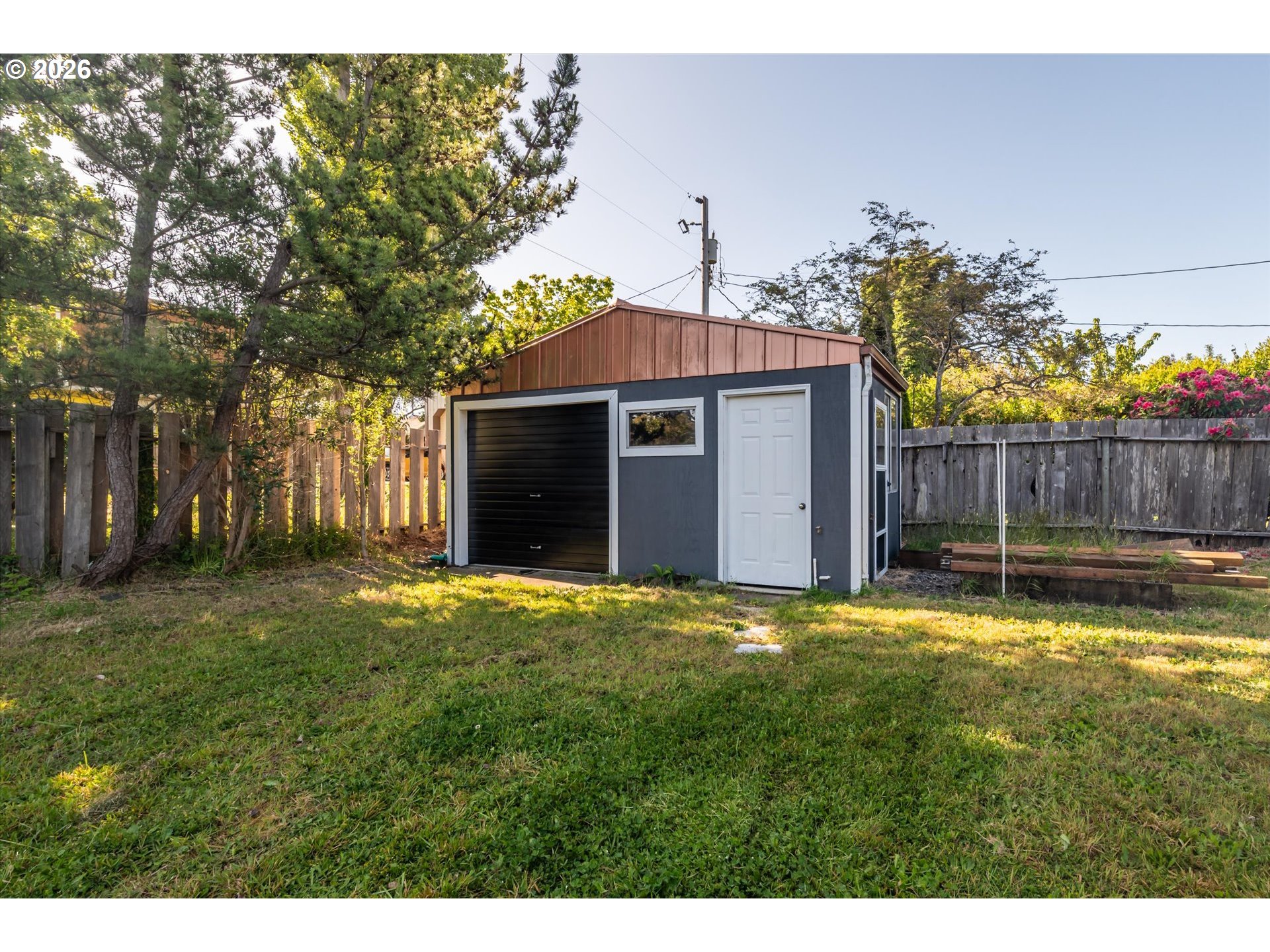 1789 14th Street North Bend, OR 97459 - Photo 35 of 43 a front view of a house with a yard