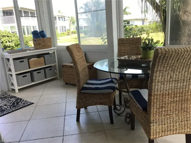 a view of a outdoor seating area with furniture