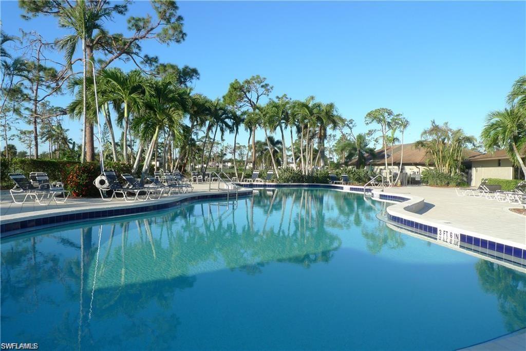 195 Peppermint Lane, Unit 881 Naples, FL 34112 - Photo 29 of 35 a view of swimming pool and lake view