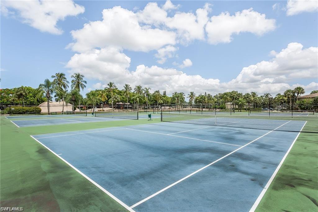 195 Peppermint Lane, Unit 881 Naples, FL 34112 - Photo 33 of 35 a view of a tennis court