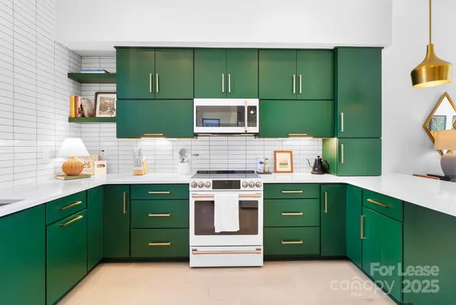 a kitchen with a sink and a microwave