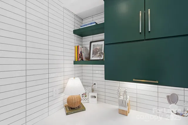 a bathroom with a sink and mirror