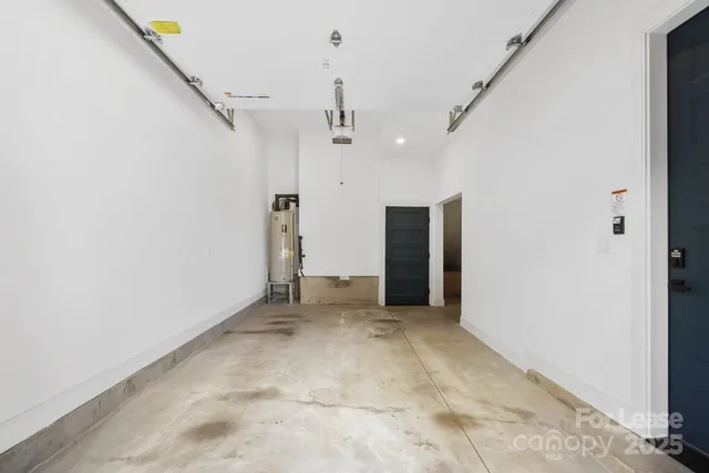 a view of a brick building next to a yard