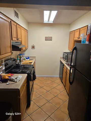 a storage room with washer and dryer
