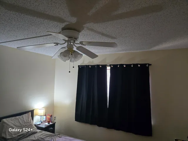 a view of a entryway door of the room