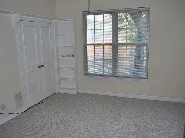 an empty room with a window