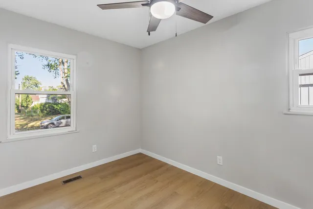 an empty room with windows