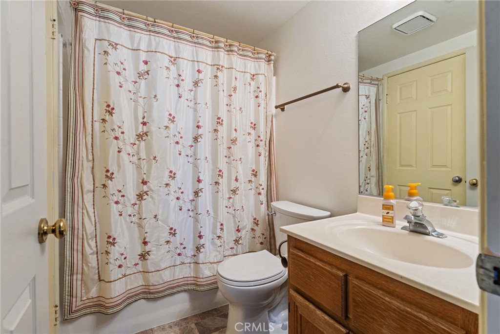 2323 Golden Lancaster, CA 93536 - Photo 13 of 34 a bathroom with a sink toilet and shower