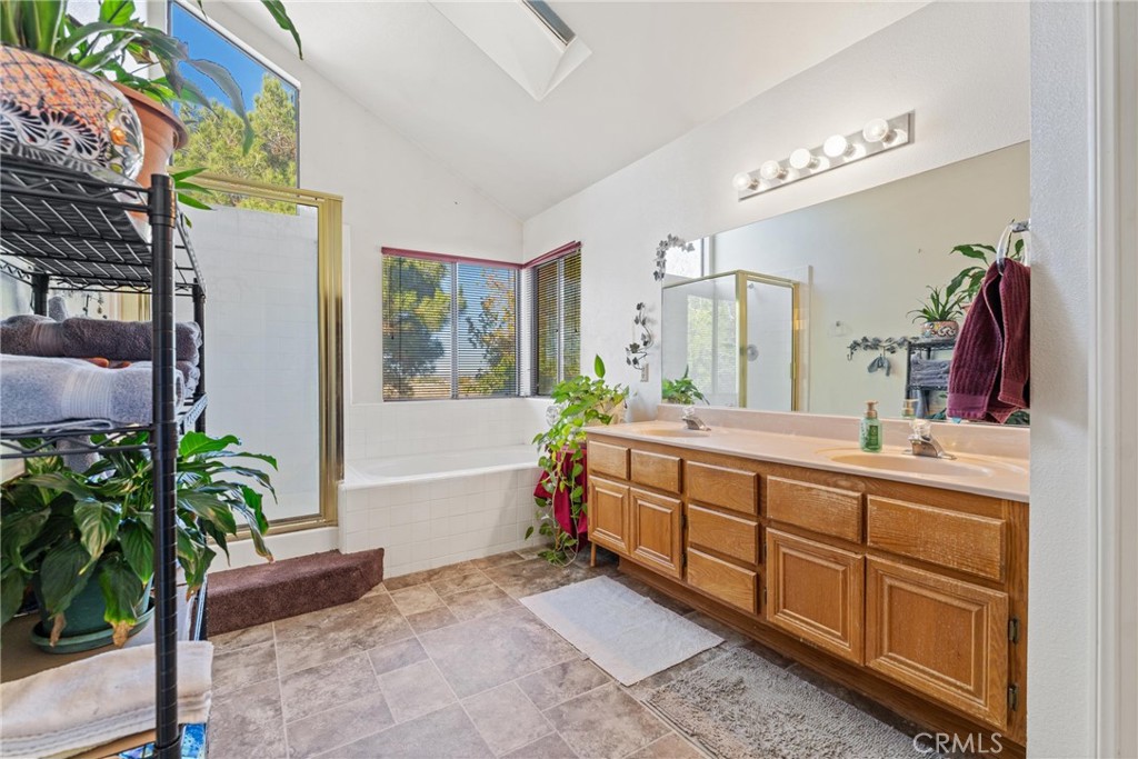 2323 Golden Lancaster, CA 93536 - Photo 22 of 34 a spacious bathroom with a double vanity sink and a mirror
