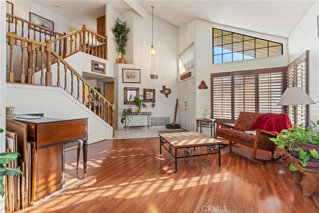 2323 Golden Lancaster, CA 93536 - Photo 6 of 34 a living room with furniture and a potted plant