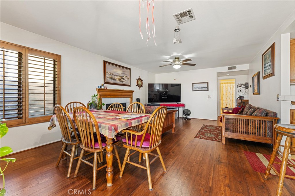 2323 Golden Lancaster, CA 93536 - Photo 7 of 34 a view of a dining room with furniture and wooden floor