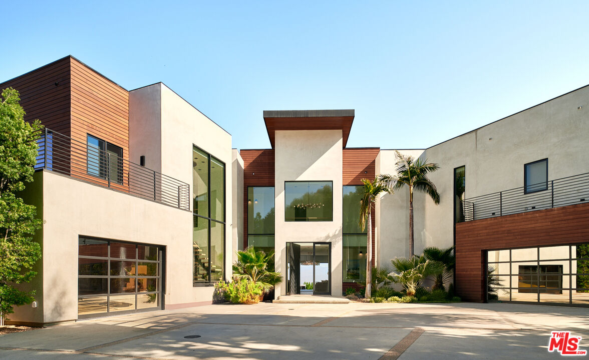 a view of a building with a street