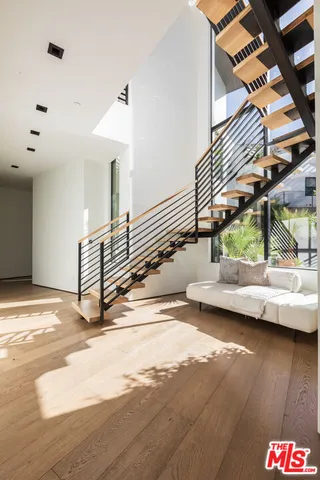a view of entryway with wooden floor