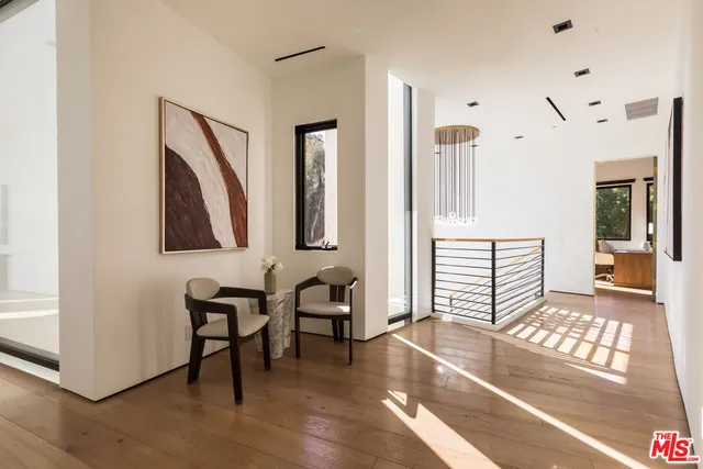 a room with gym equipment and a large window