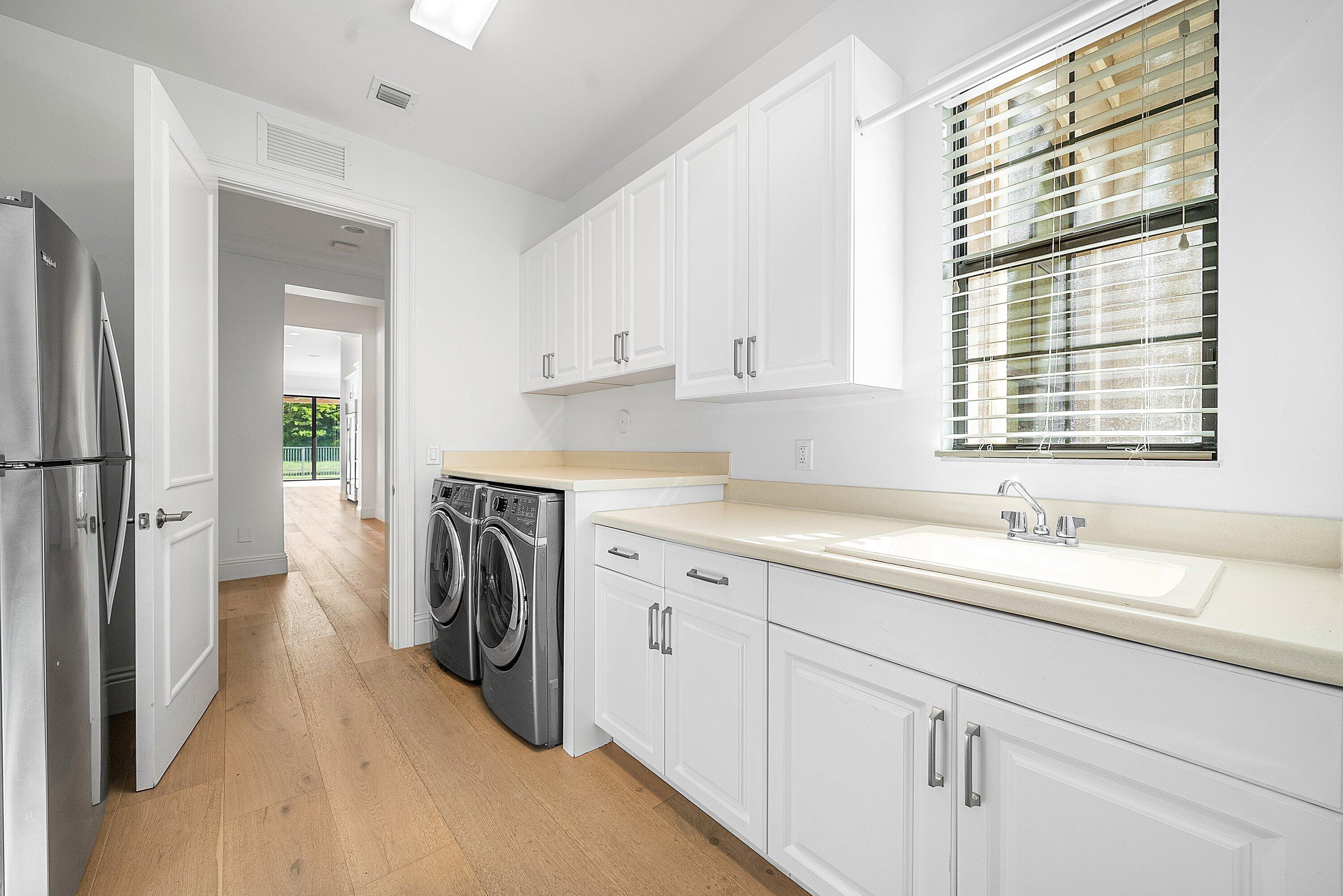 9599 Moritz Way Delray Beach, FL 33446 - Photo 39 of 64 laundry room