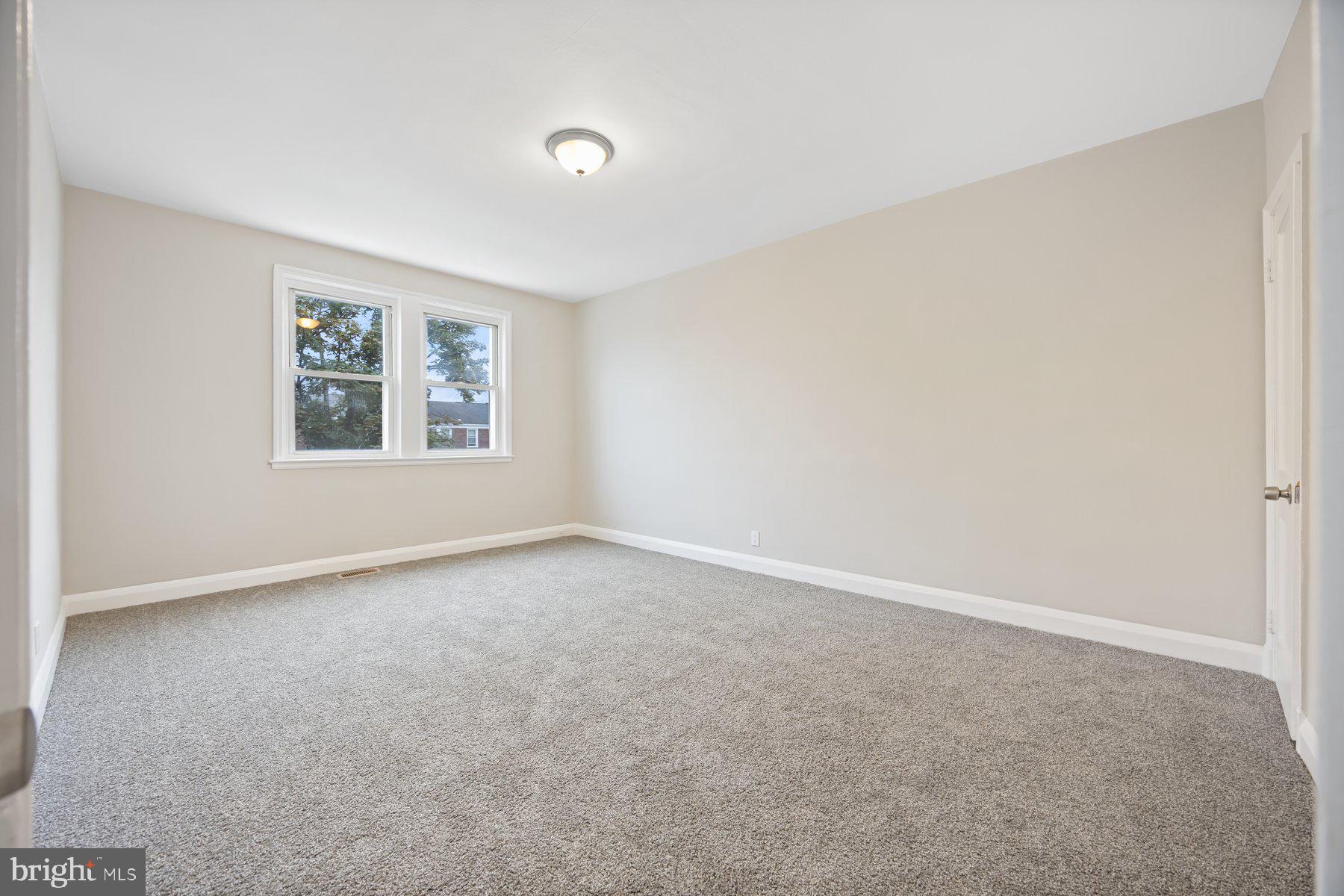1526 Sheffield Road Baltimore, MD 21218 - Photo 15 of 20 an empty room with a window