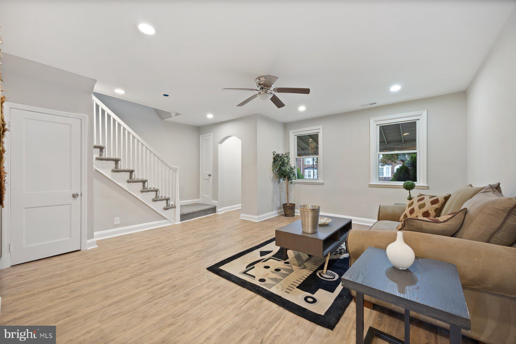 1526 Sheffield Road Baltimore, MD 21218 - Photo 10 of 20 a living room with furniture and a wooden floor