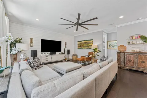 a bathroom with a sink vanity mirror and toilet