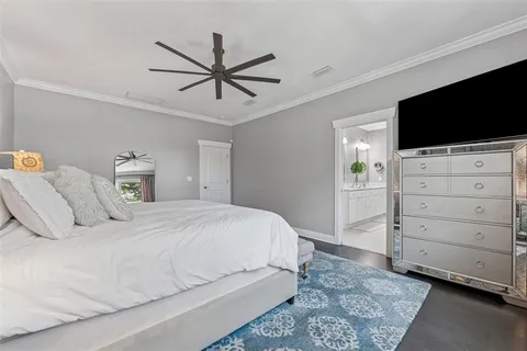 a en suite bathroom with double sink and a mirror