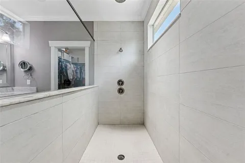 a bedroom with a bed and a table in it