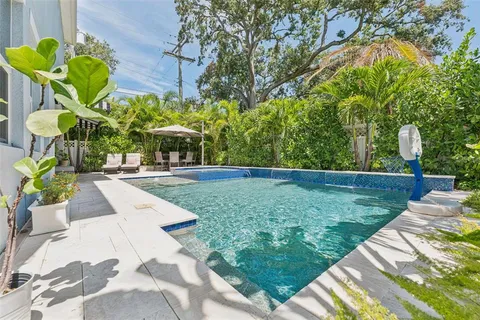a view of a garden with a bench