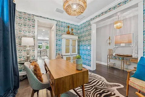 a kitchen with center island and stainless steel appliances