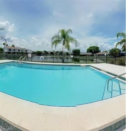 a view of a swimming pool and outdoor space