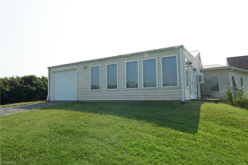 3337 New Salem Road Climax, NC 27233 - Photo 22 of 30 Cottage garage and sunroom