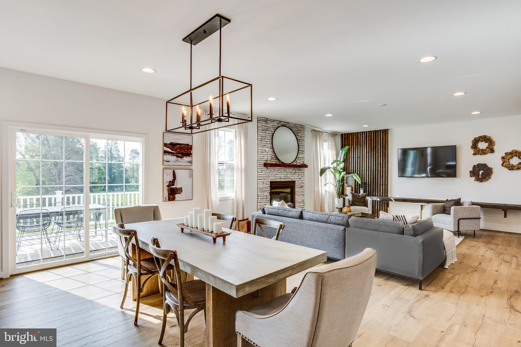 9 Burwell Road Nokesville, VA 20181 - Photo 21 of 61 a view of a dining room with furniture window and wooden floor