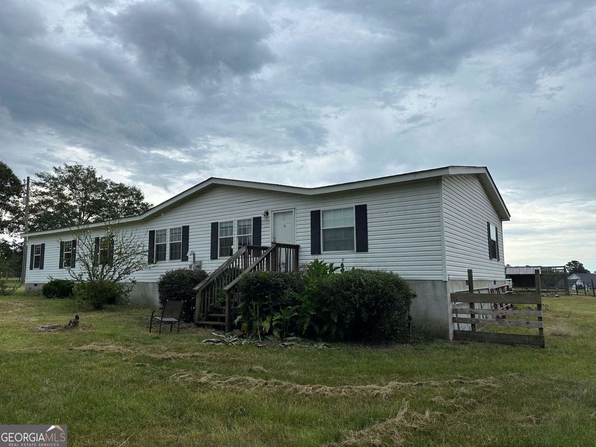 a house view with a garden space